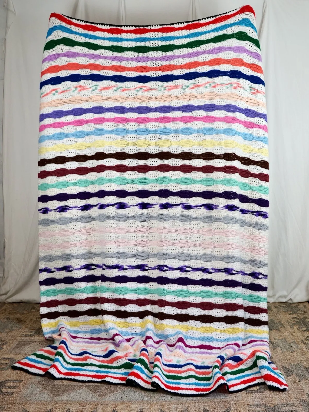 Handknit Rainbow Wavelength Blanket